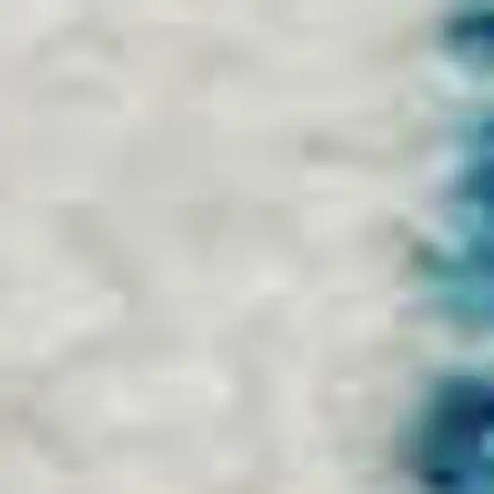 Teal And Ivory Geometric Washable Area Rug With UV Protection Photo 3