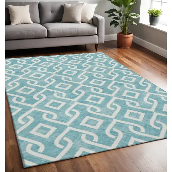 Teal And Ivory Geometric Washable Area Rug With UV Protection Photo 2