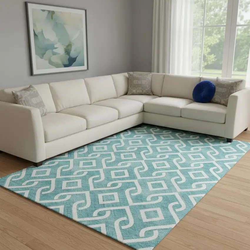 Teal And Ivory Geometric Washable Area Rug With UV Protection Photo 1