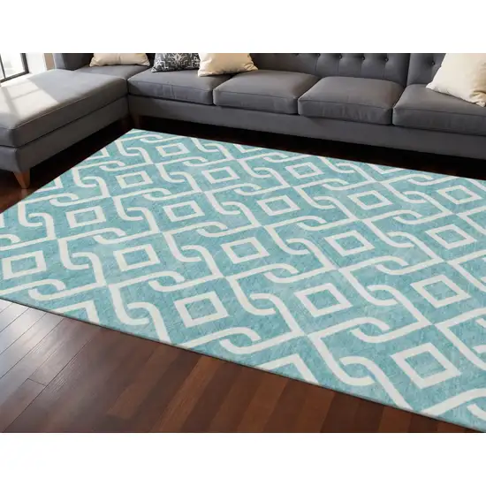 Teal And Ivory Geometric Washable Area Rug With UV Protection Photo 2