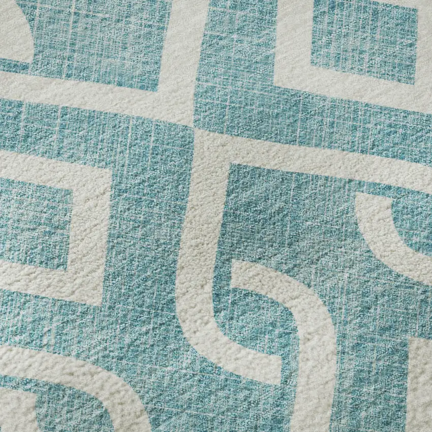 Teal And Ivory Geometric Washable Area Rug With UV Protection Photo 9