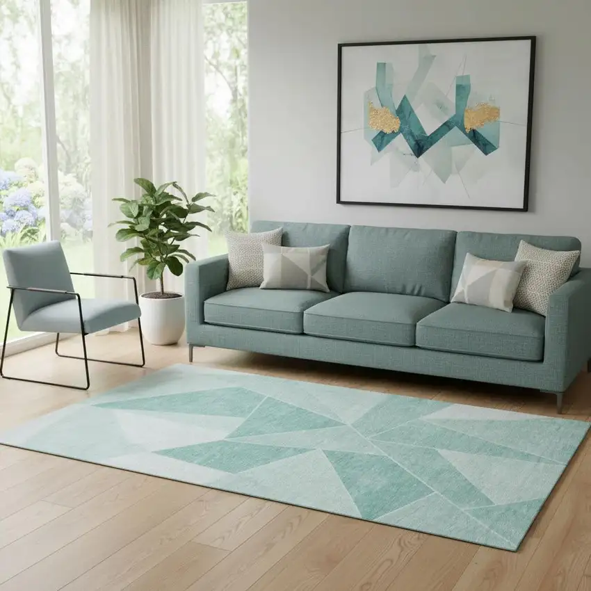 Teal And Ivory Geometric Washable Area Rug With UV Protection Photo 1