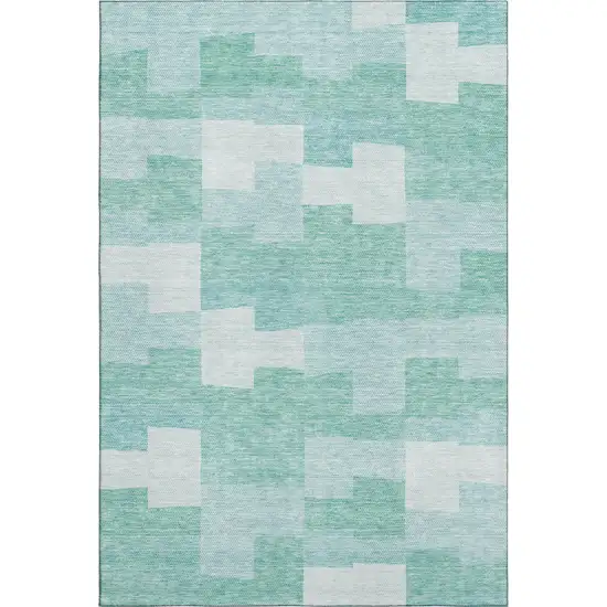 Teal And Ivory Geometric Washable Area Rug With UV Protection Photo 1