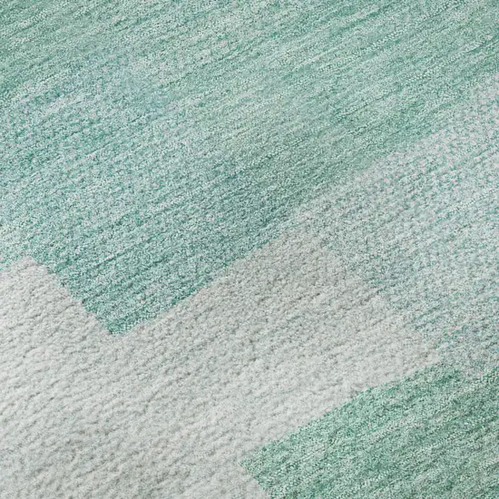 Teal And Ivory Geometric Washable Area Rug With UV Protection Photo 9