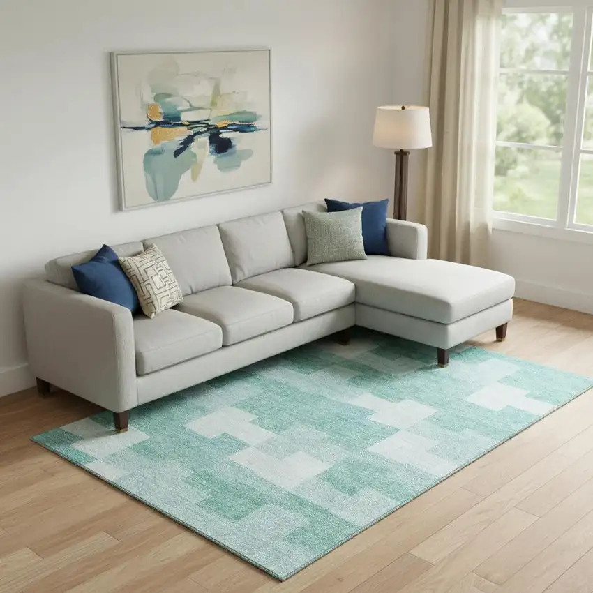Teal And Ivory Geometric Washable Area Rug With UV Protection Photo 1