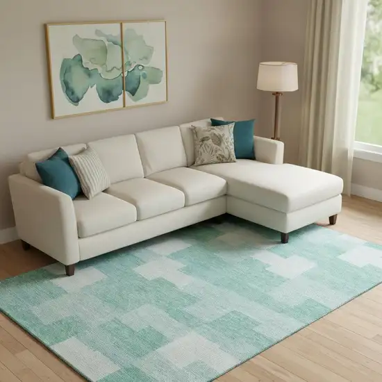 Teal And Ivory Geometric Washable Area Rug With UV Protection Photo 1