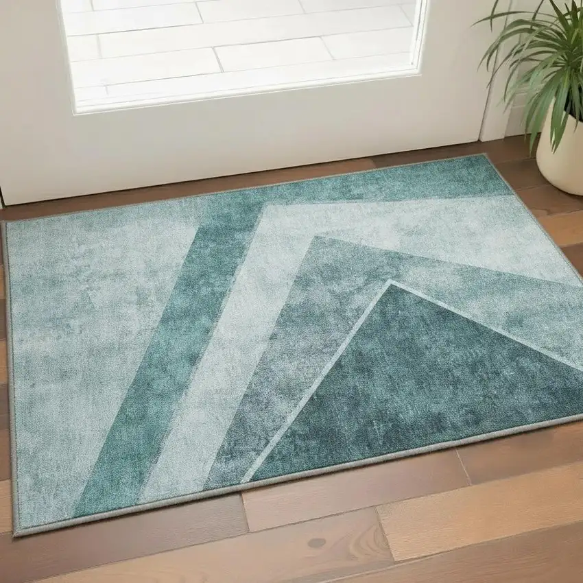 Teal And Ivory Geometric Washable Area Rug With UV Protection Photo 2