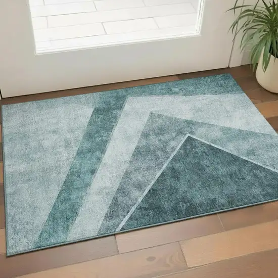 Teal And Ivory Geometric Washable Area Rug With UV Protection Photo 1