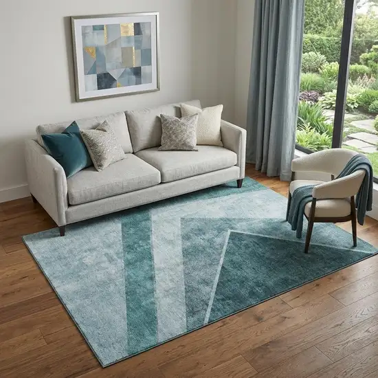 Teal And Ivory Geometric Washable Area Rug With UV Protection Photo 1