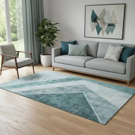 Teal And Ivory Geometric Washable Area Rug With UV Protection Photo 1