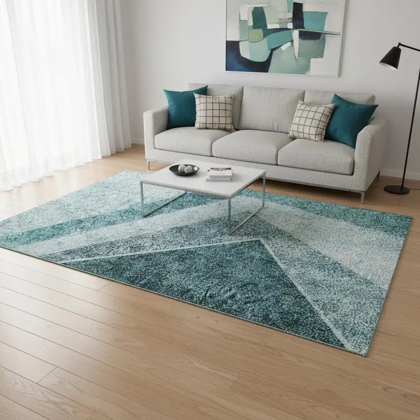 Teal And Ivory Geometric Washable Area Rug With UV Protection Photo 1