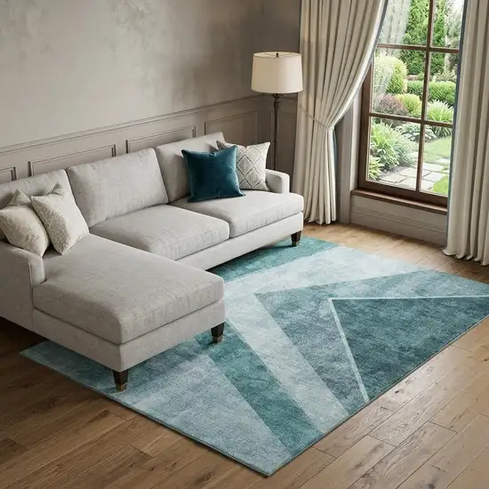 Teal And Ivory Geometric Washable Area Rug With UV Protection Photo 1