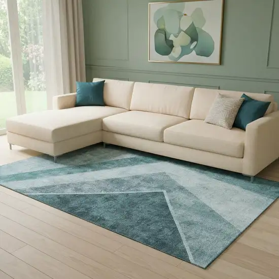 Teal And Ivory Geometric Washable Area Rug With UV Protection Photo 1