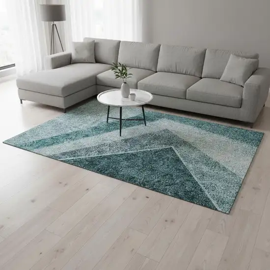 Teal And Ivory Geometric Washable Area Rug With UV Protection Photo 1