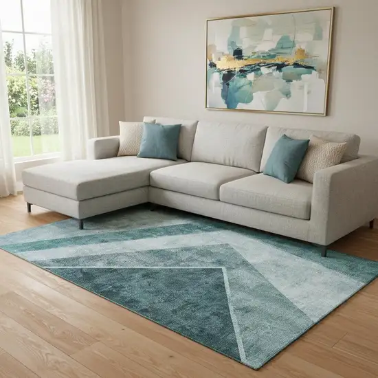 Teal And Ivory Geometric Washable Area Rug With UV Protection Photo 1