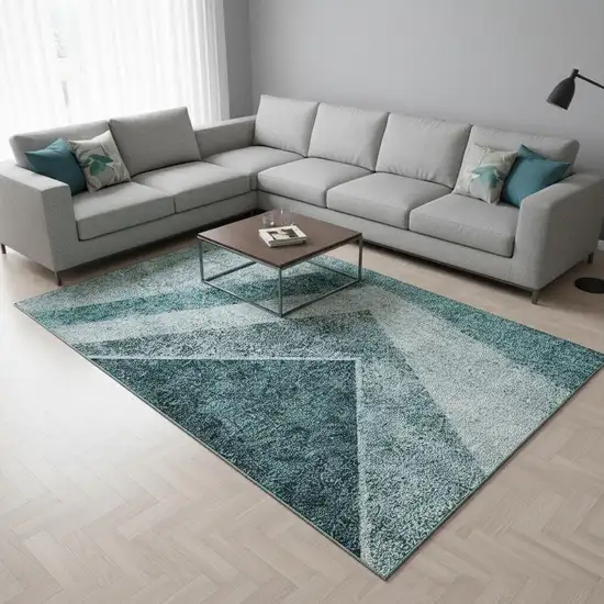Teal And Ivory Geometric Washable Area Rug With UV Protection Photo 1