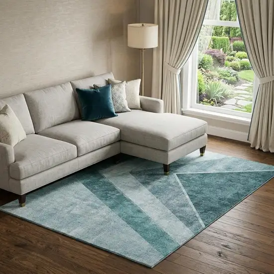 Teal And Ivory Geometric Washable Area Rug With UV Protection Photo 1