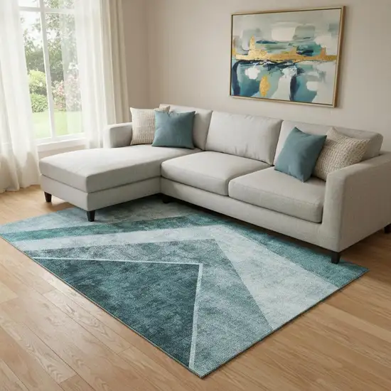 Teal And Ivory Geometric Washable Area Rug With UV Protection Photo 1