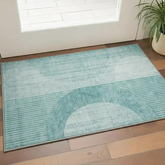 Teal And Ivory Geometric Washable Area Rug With UV Protection Photo 2