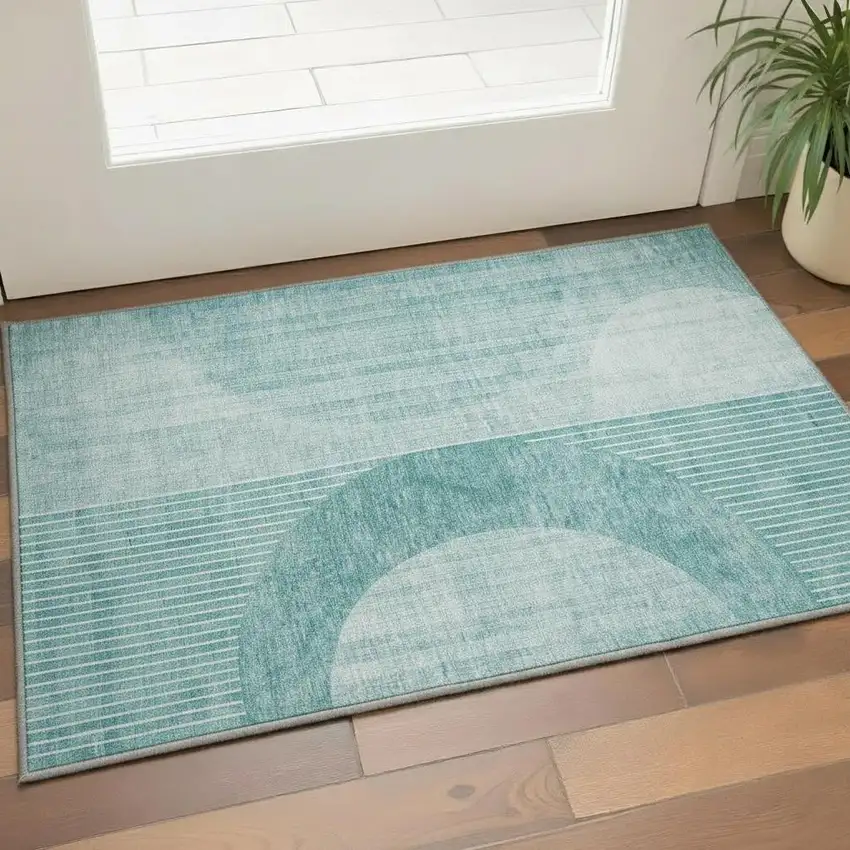 Teal And Ivory Geometric Washable Area Rug With UV Protection Photo 2