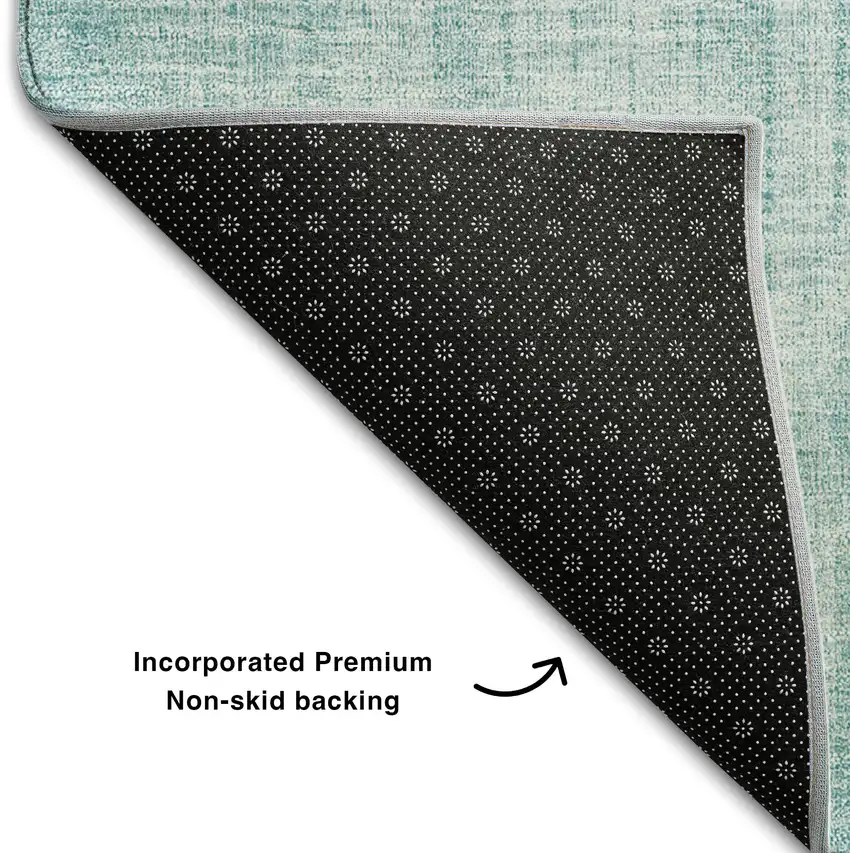 Teal And Ivory Geometric Washable Area Rug With UV Protection Photo 6
