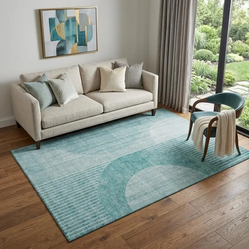 Teal And Ivory Geometric Washable Area Rug With UV Protection Photo 1