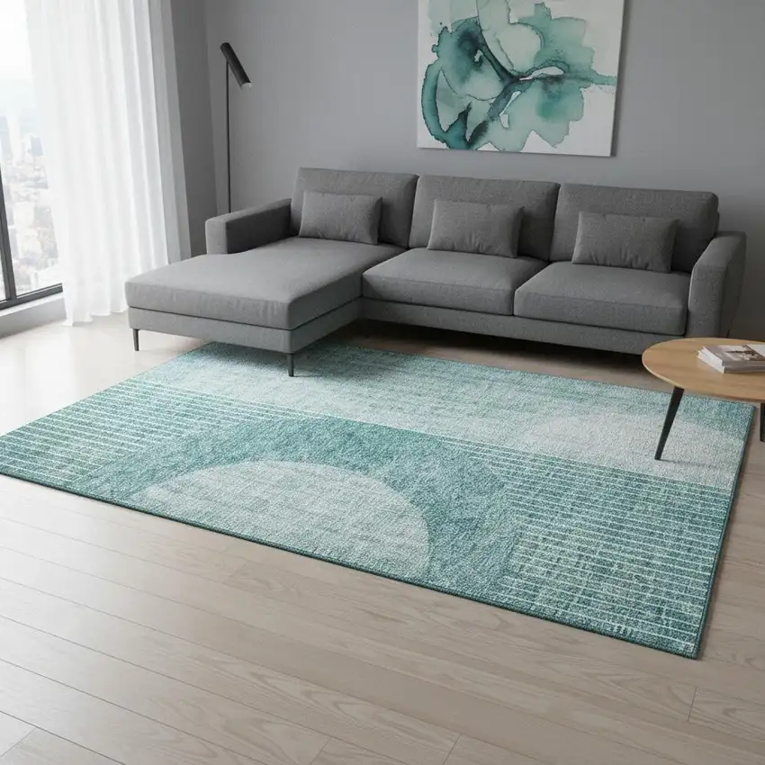 Teal And Ivory Geometric Washable Area Rug With UV Protection Photo 1