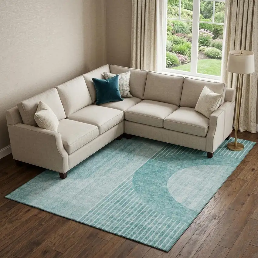 Teal And Ivory Geometric Washable Area Rug With UV Protection Photo 1