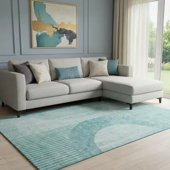 Teal And Ivory Geometric Washable Area Rug With UV Protection Photo 1