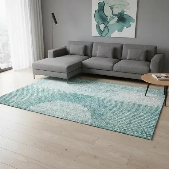 Teal And Ivory Geometric Washable Area Rug With UV Protection Photo 1
