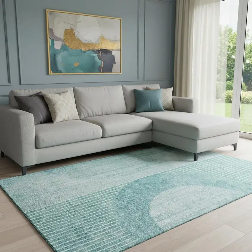 Teal And Ivory Geometric Washable Area Rug With UV Protection Photo 1
