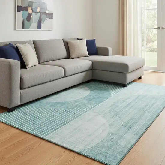 Teal And Ivory Geometric Washable Area Rug With UV Protection Photo 1