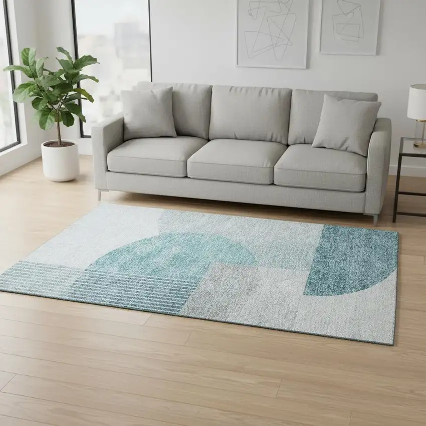 Teal And Ivory Geometric Washable Area Rug With UV Protection Photo 3