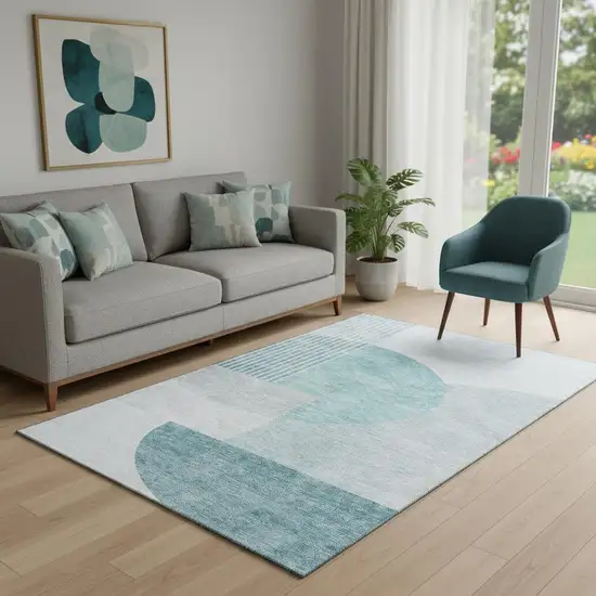 Teal And Ivory Geometric Washable Area Rug With UV Protection Photo 1