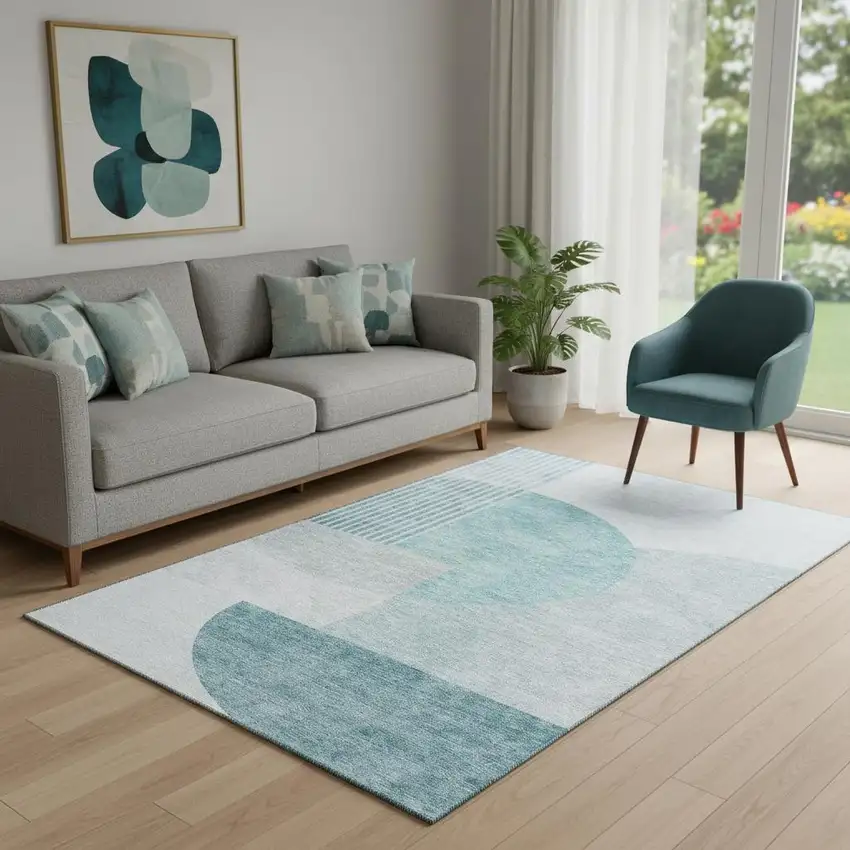 Teal And Ivory Geometric Washable Area Rug With UV Protection Photo 1