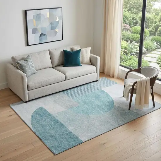 Teal And Ivory Geometric Washable Area Rug With UV Protection Photo 1