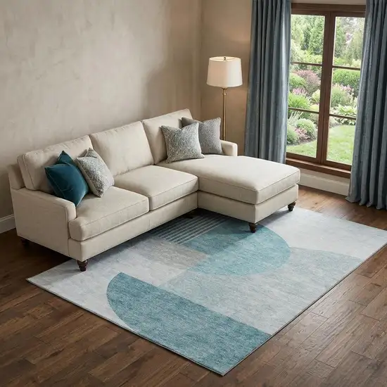 Teal And Ivory Geometric Washable Area Rug With UV Protection Photo 1