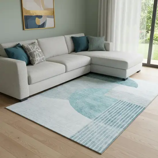 Teal And Ivory Geometric Washable Area Rug With UV Protection Photo 1