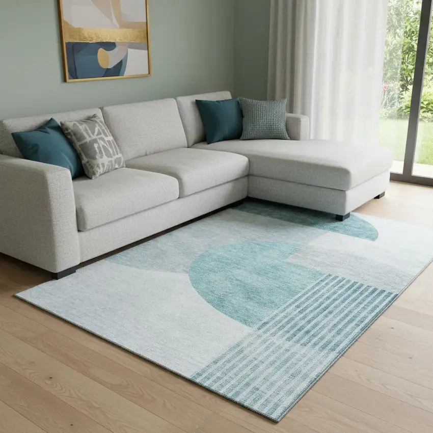 Teal And Ivory Geometric Washable Area Rug With UV Protection Photo 1