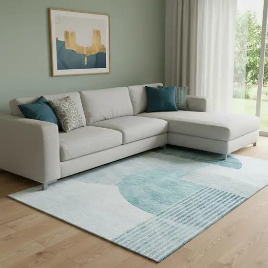 Teal And Ivory Geometric Washable Area Rug With UV Protection Photo 1
