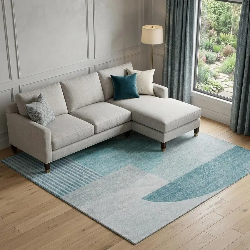 Teal And Ivory Geometric Washable Area Rug With UV Protection Photo 1