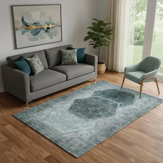 Teal And Ivory Geometric Washable Area Rug With UV Protection Photo 1