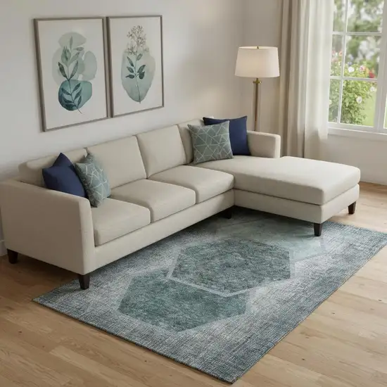 Teal And Ivory Geometric Washable Area Rug With UV Protection Photo 1