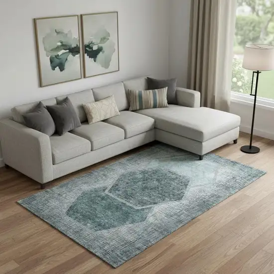 Teal And Ivory Geometric Washable Area Rug With UV Protection Photo 1