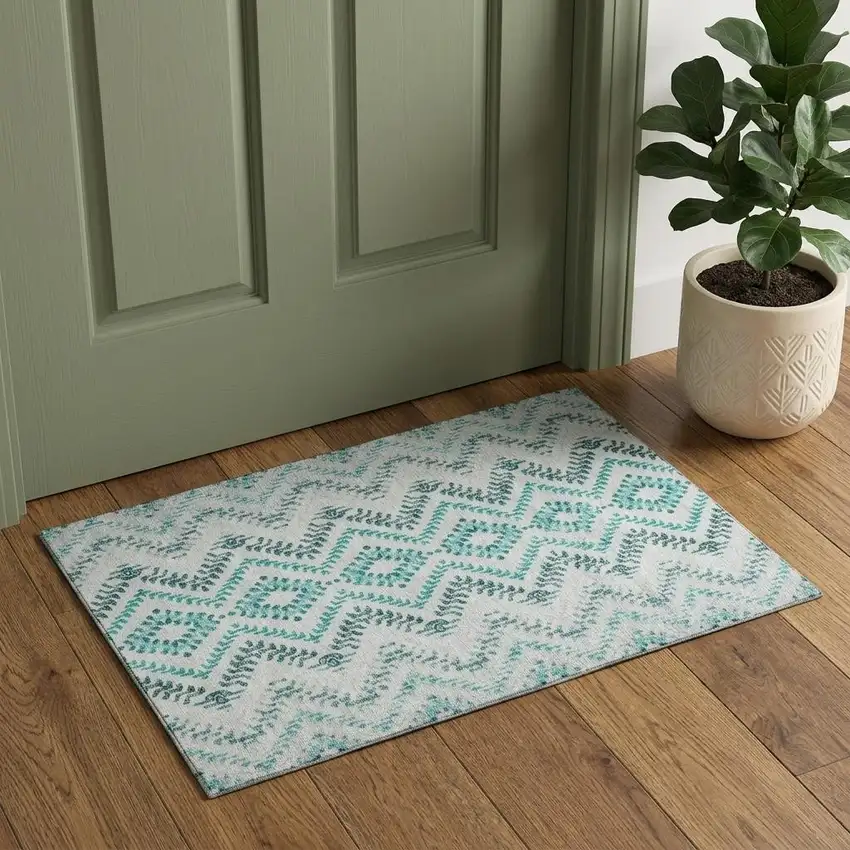Teal And Ivory Geometric Washable Area Rug With UV Protection Photo 1