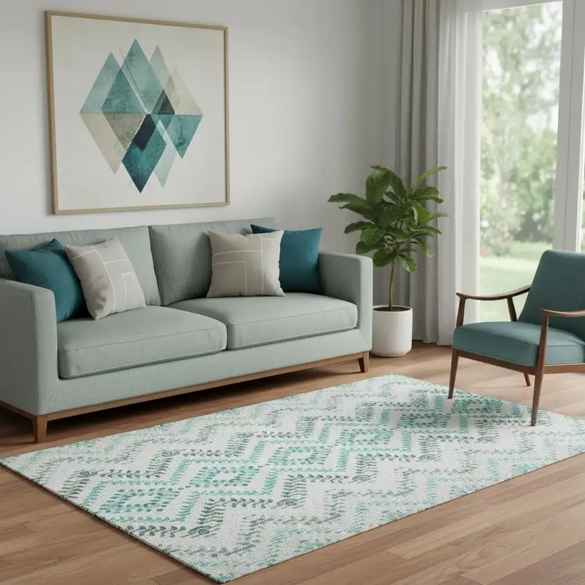 Teal And Ivory Geometric Washable Area Rug With UV Protection Photo 1