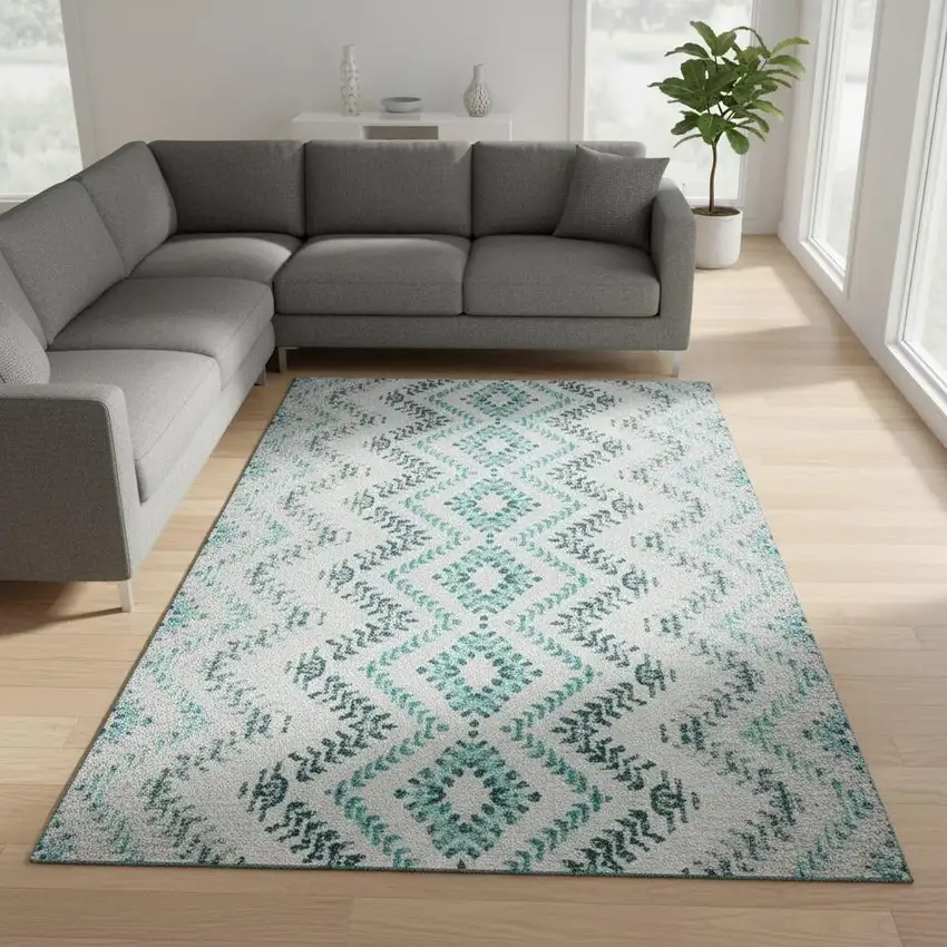 Teal And Ivory Geometric Washable Area Rug With UV Protection Photo 1