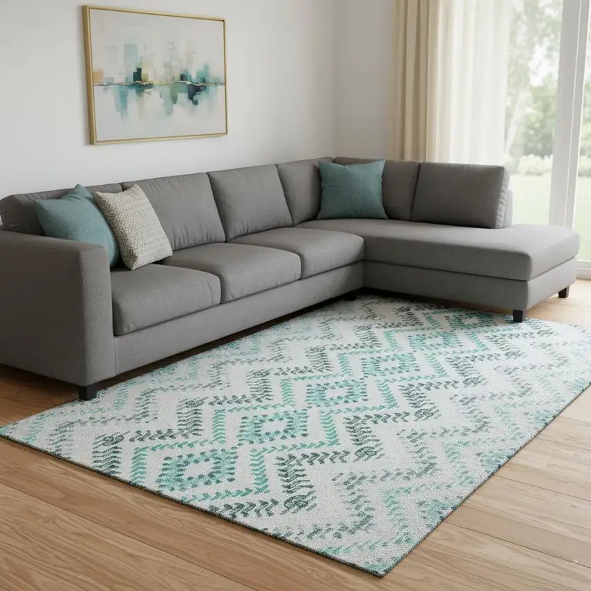 Teal And Ivory Geometric Washable Area Rug With UV Protection Photo 1