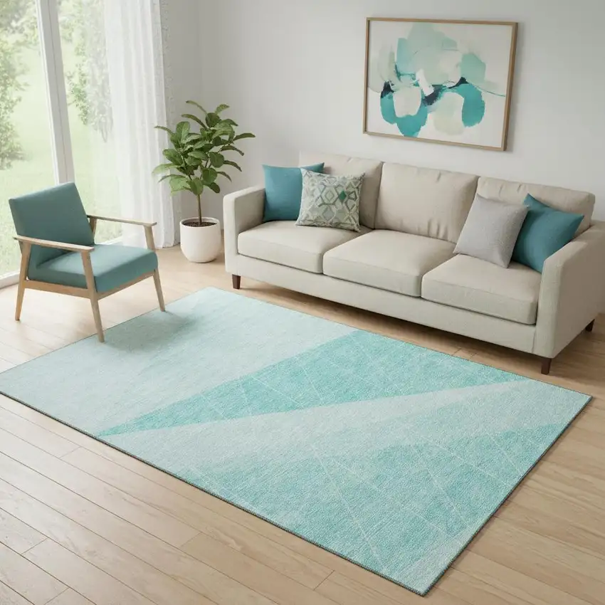 Teal And Ivory Geometric Washable Area Rug With UV Protection Photo 1