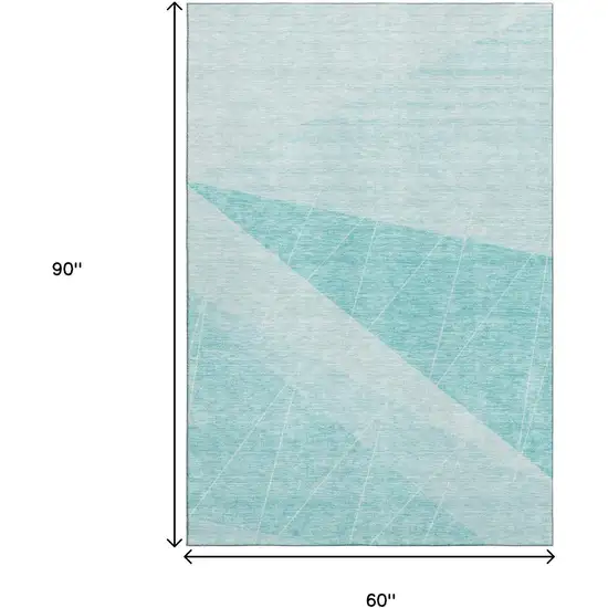 Teal And Ivory Geometric Washable Area Rug With UV Protection Photo 3